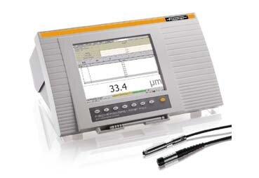 FischerScope XRF coating thickness measurement instrument on a shop bench